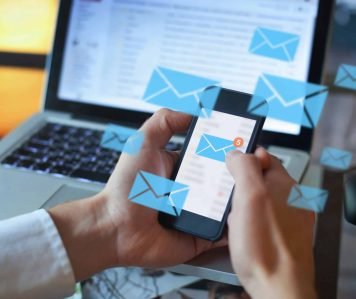 email marketing concept, person reading e-mail on smartphone, receive new message